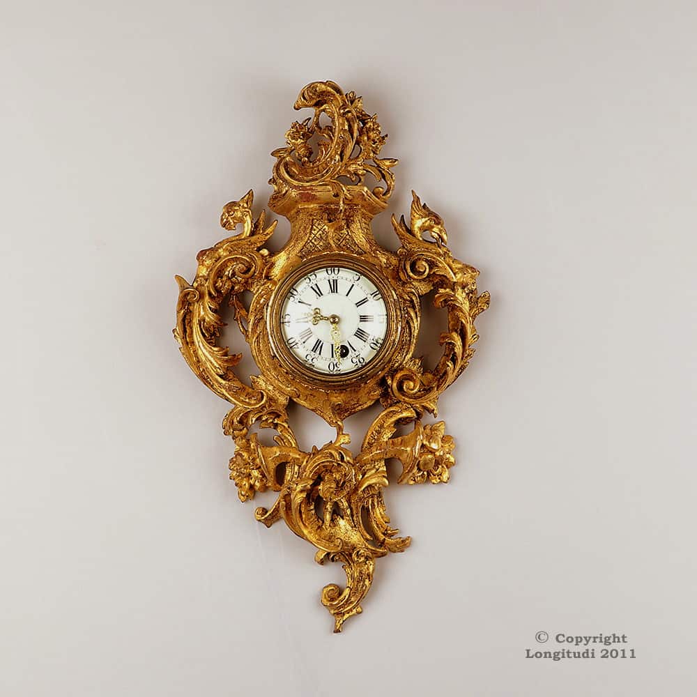 Gilded miniature wall clock